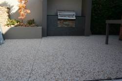 Outdoor area with aggregate concrete
